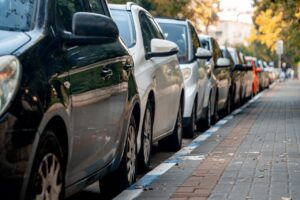 Row,Of,Cars,Parked,Near,The,Sidewalk,(237)
