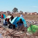Ordenan desalojar un predio ocupado por unas 100 personas